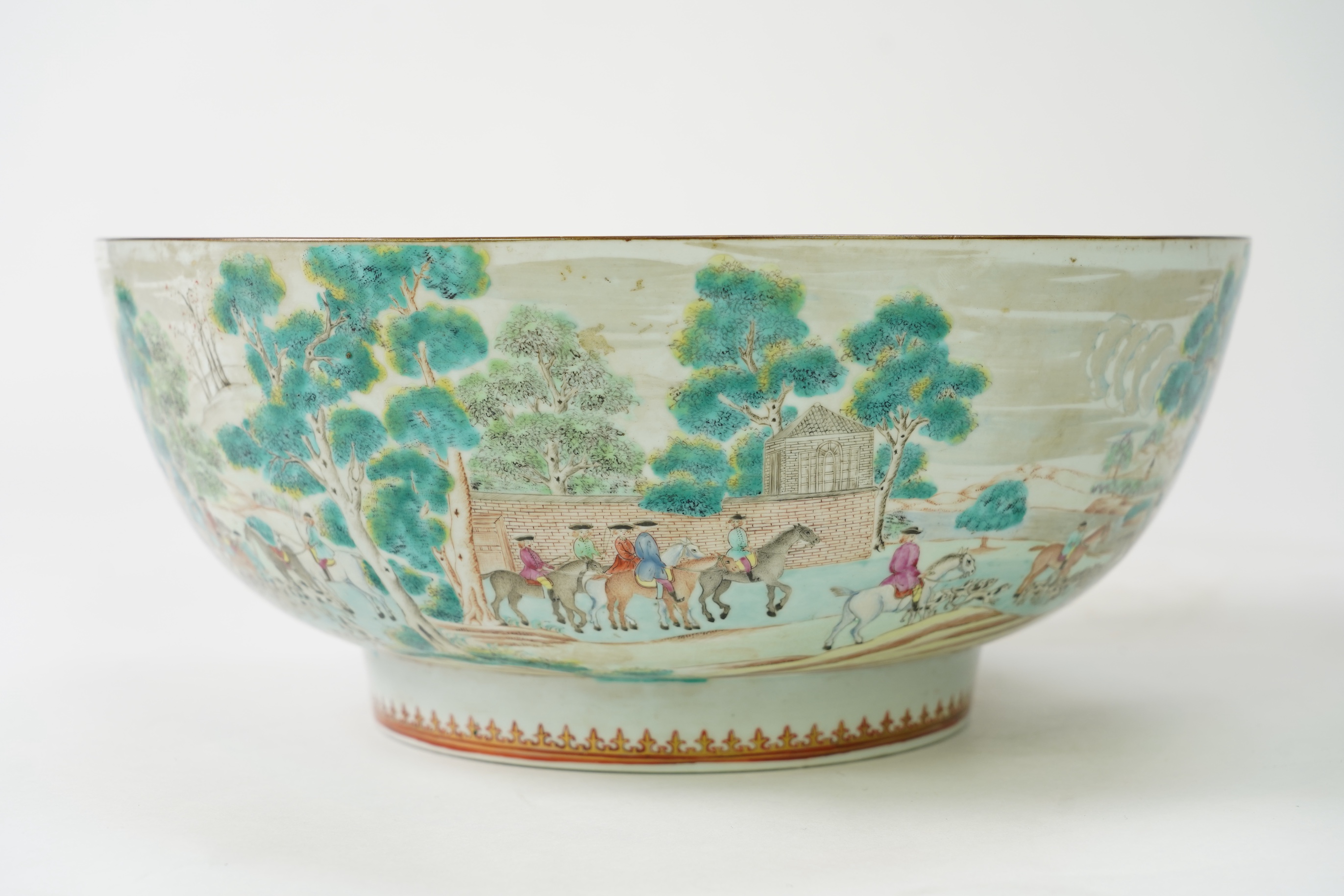 A large Chinese European subject ‘hunting’ punch bowl, Qianlong period